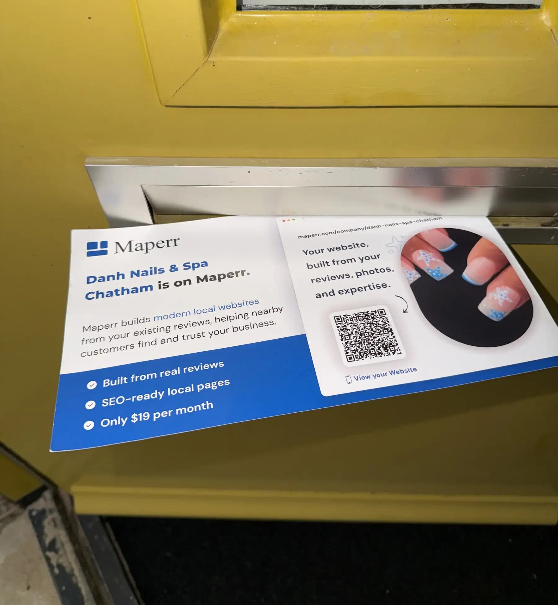 Maperr postcard in a mail slot with personalized local business messaging